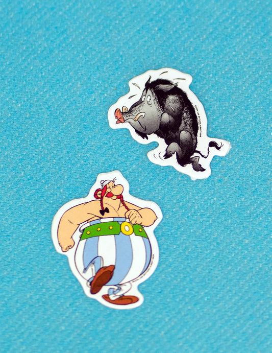 Détail illustrant Obélix et un sanglier des confettis de table Astérix