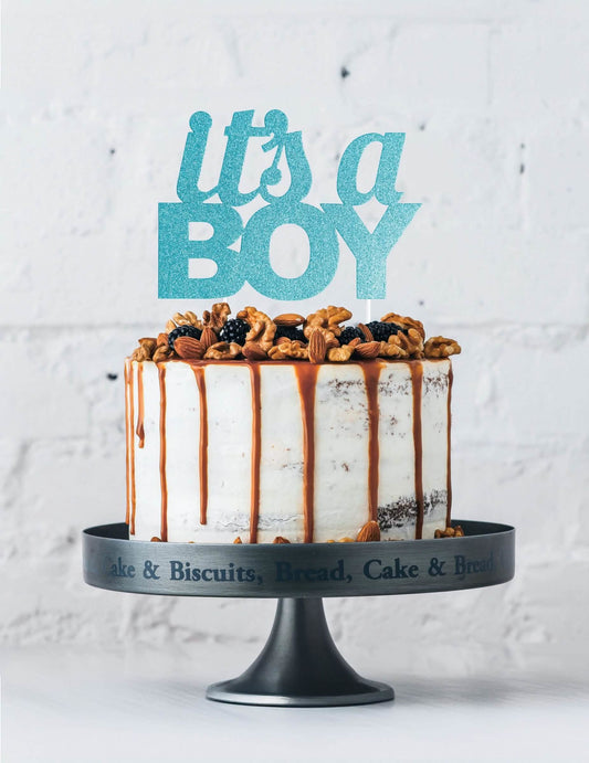 Mise en situation sur un gâteau du cake topper it's a boy pour baby shower