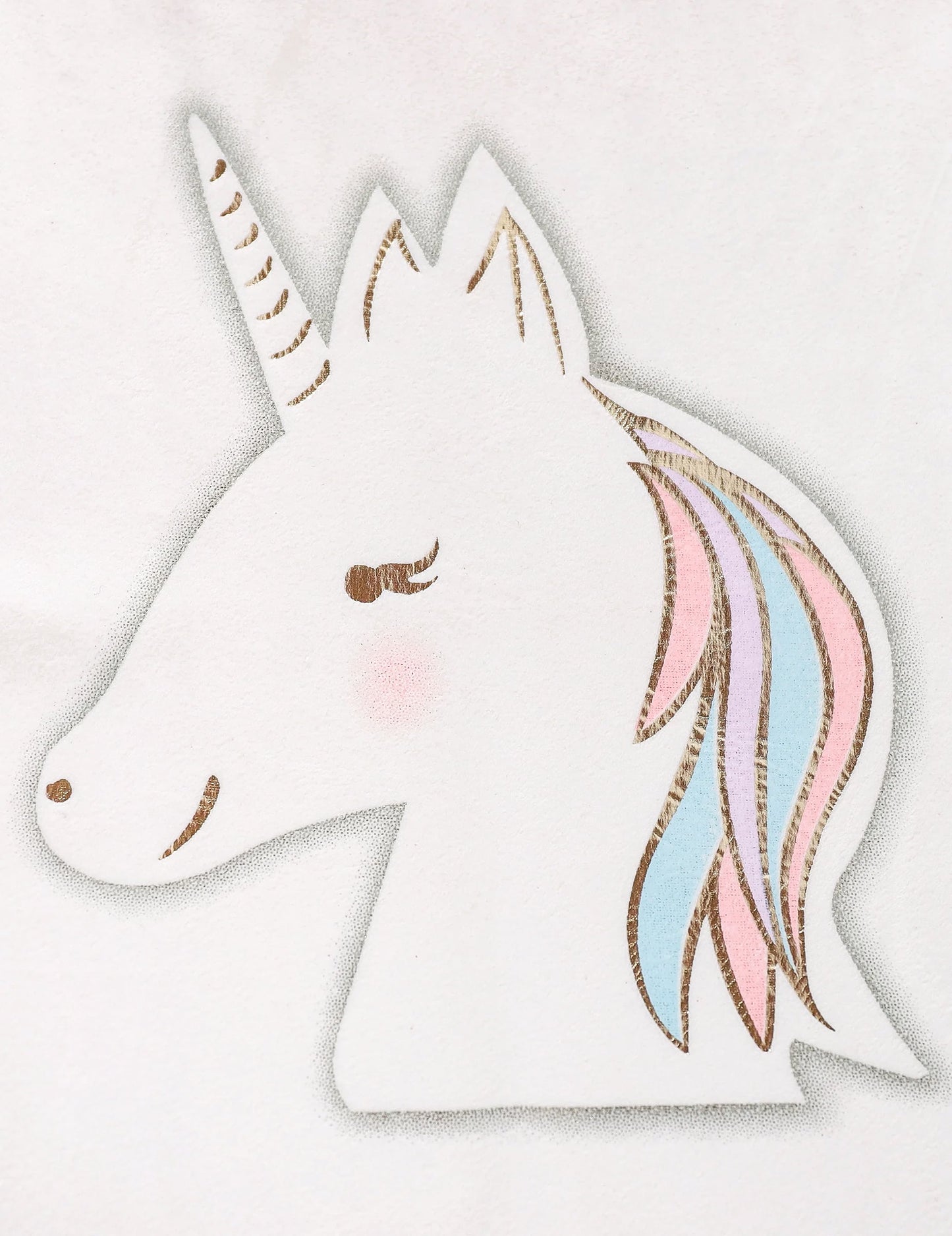 Gros plan sur la tête de licorne du chemin de table licorne pastel
