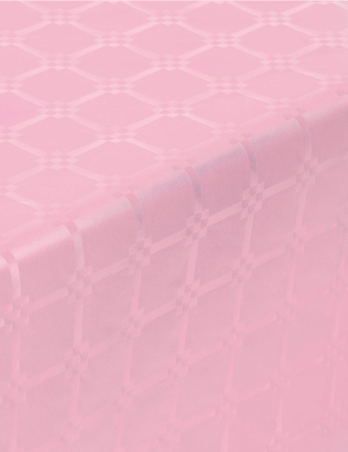 Détail des motifs de la nappe en rouleau papier damassé rose pastel