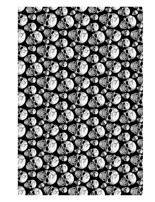 Nappe tête de mort noir et blanc avec motifs de crânes