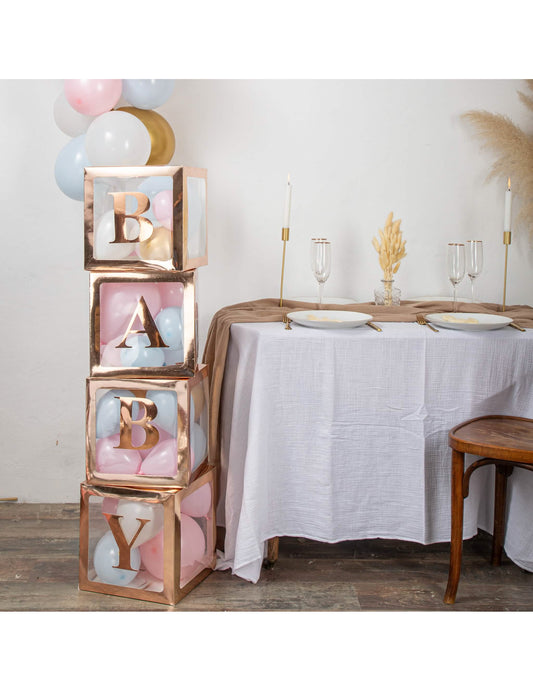 Mise en scène des stickers baby lettres pour baby shower rose gold