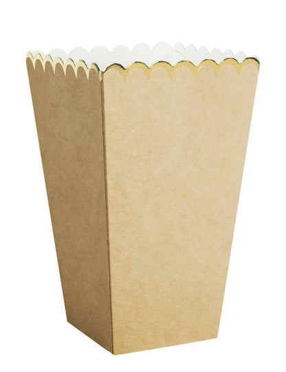 Vue de trois-quarts des boîtes à pop corn kraft et or