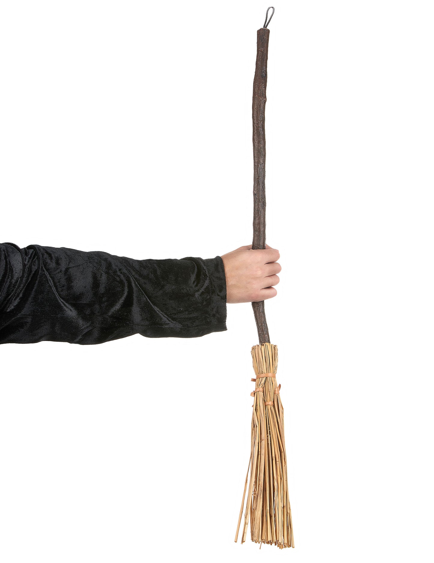 Mise en situation du balai de sorcière tenu par une main