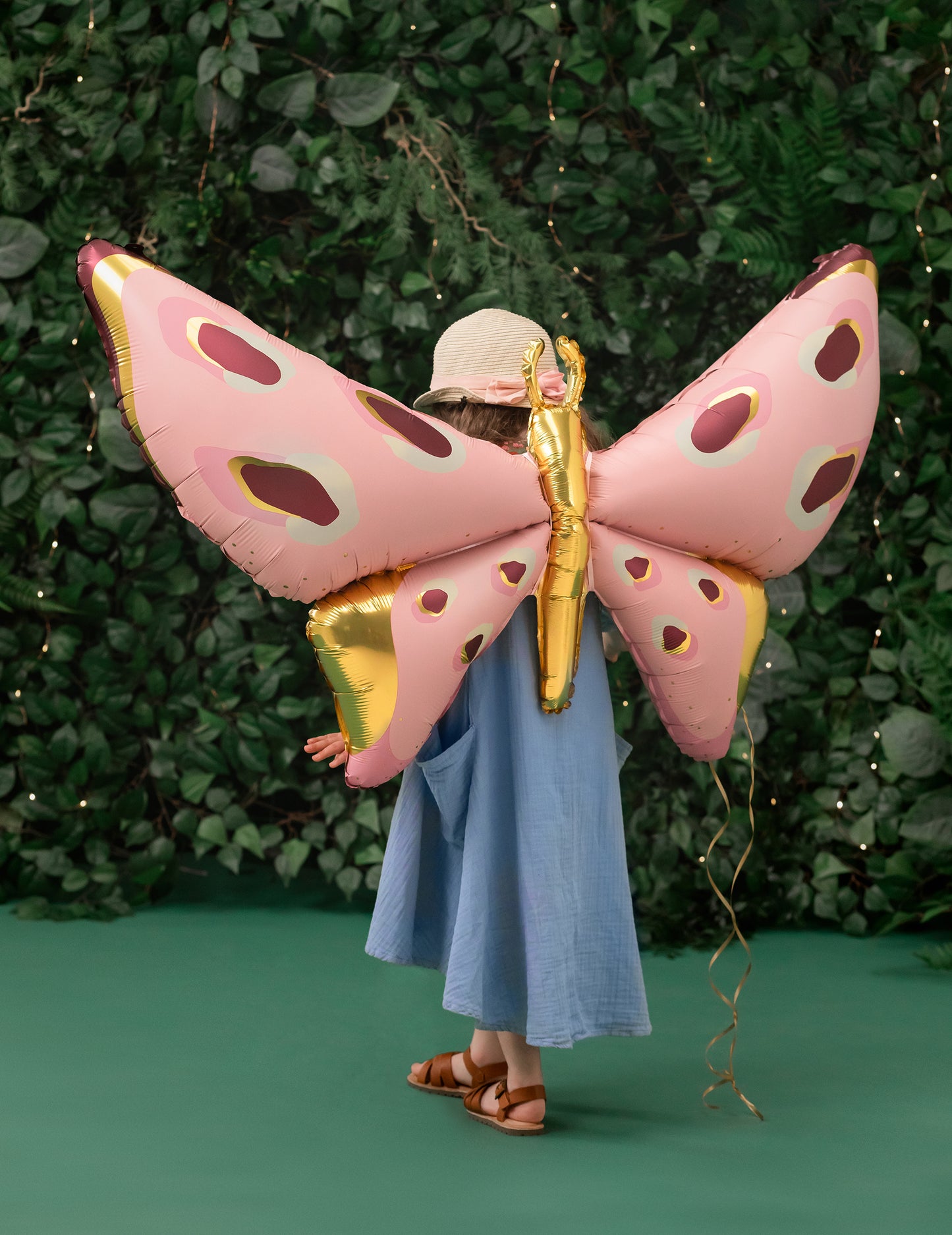 Ballon géant en aluminium papillon 120 x 87 cm rose et or