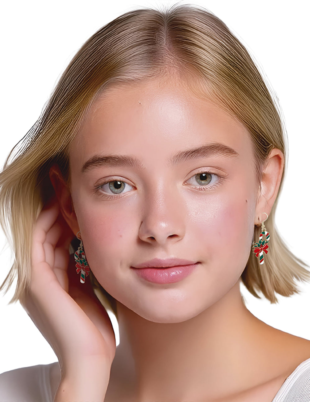 Vue portée des boucles d'oreilles métalliques canne à sucre de Noël