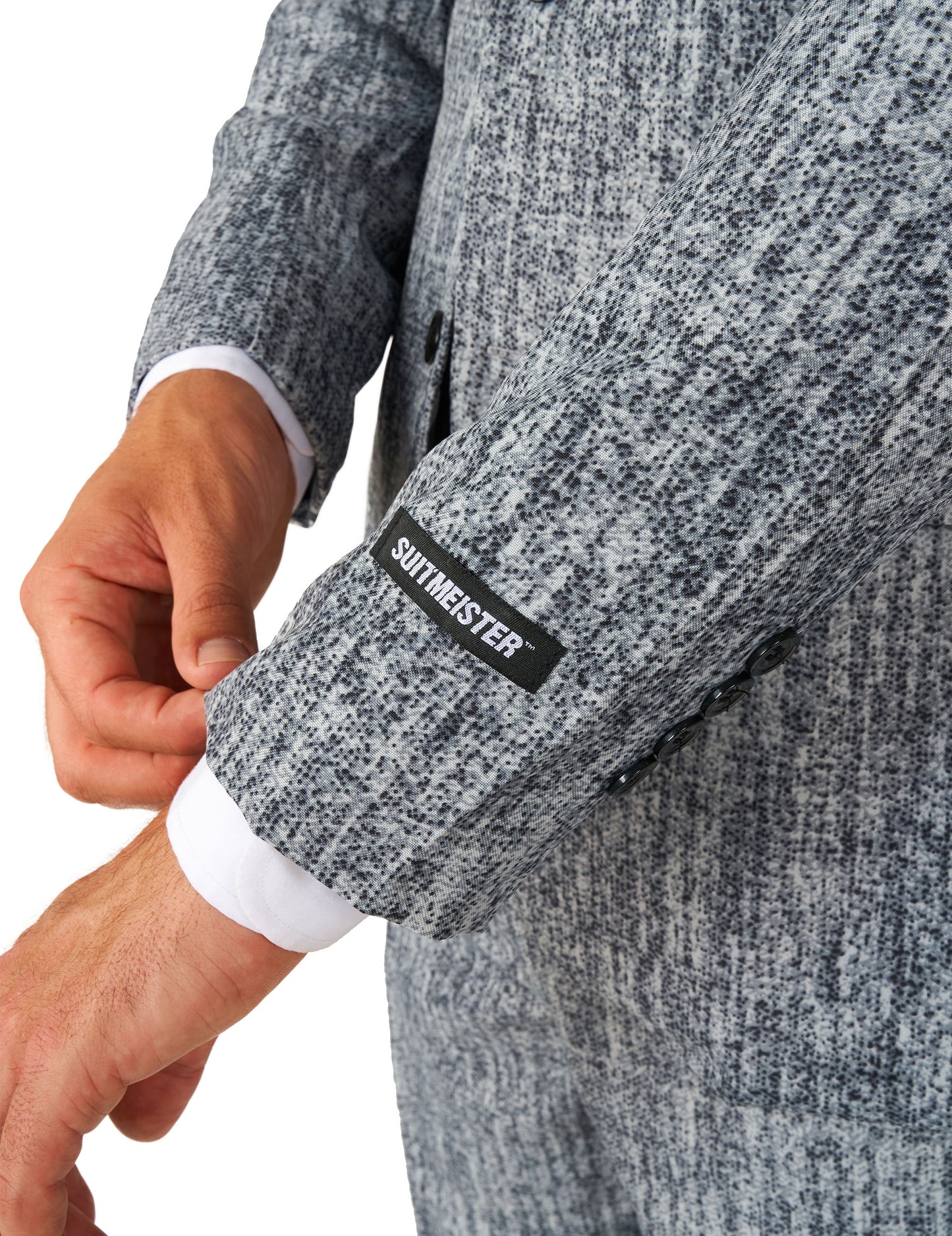 Détail de l'étiquette Suitmeister sur la manche du costume Mr. Années 20 Gangster