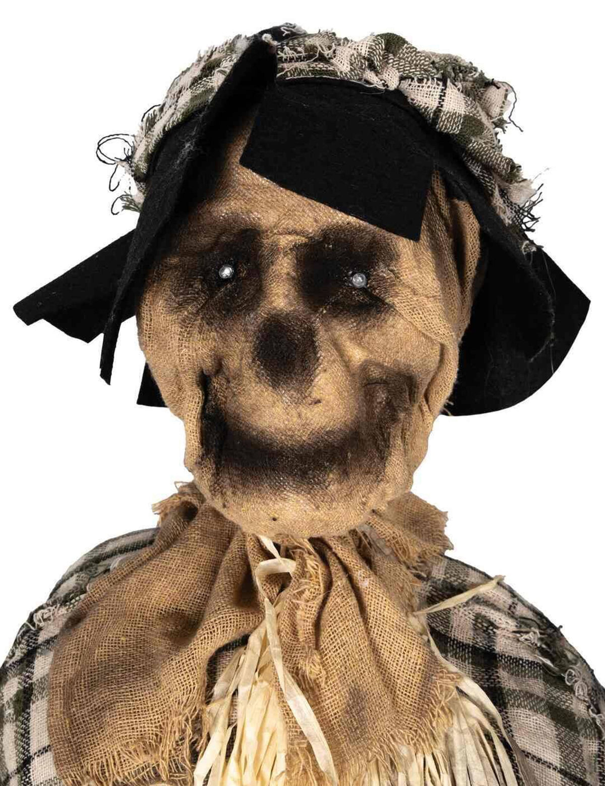 Gros plan sur le visage de la décoration animée épouvantail sur chaise à bascule sonore et lumineux