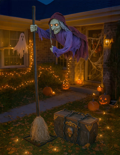 Décoration animée sorcière planante pour Halloween violette avec yeux lumineux et balai