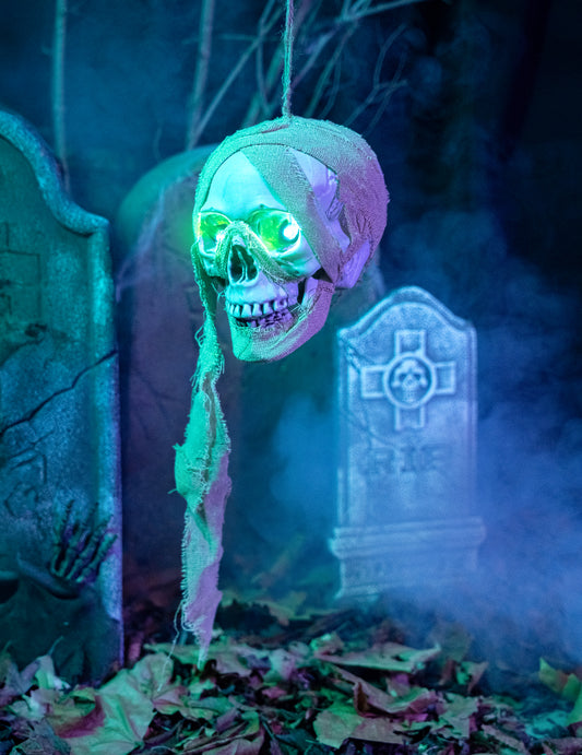 Effet lumineux des yeux verts de la décoration lumineuse tête de mort pirate à suspendre