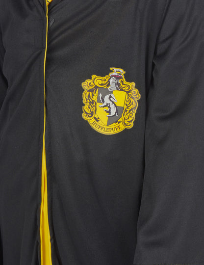 Détail de l'écusson du déguisement classique Poufsouffle Harry Potter pour enfant