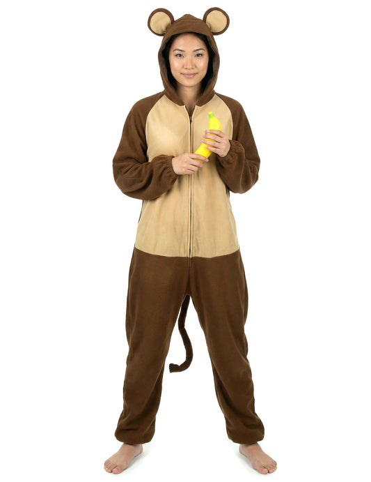 Banane tenue à la main du déguisement de singe
