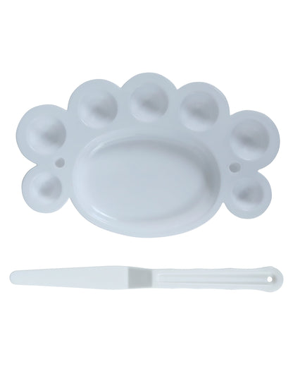 Vue de la spatule et de la palette blanche du Kit pinceaux et palette à maquillage