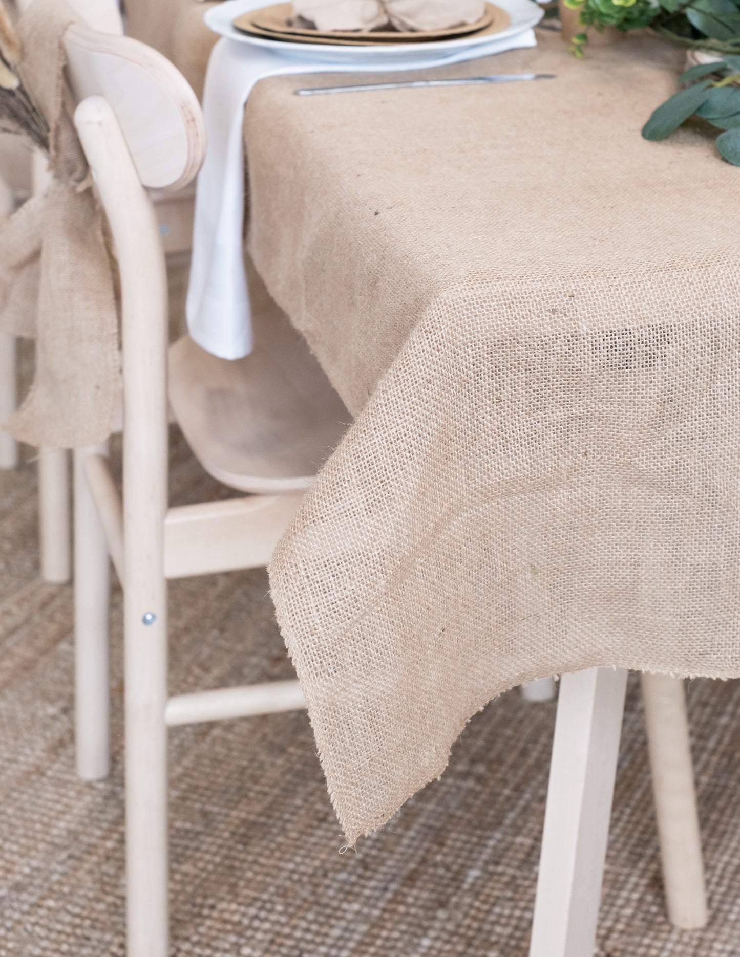 Zoom sur le coin de la nappe rectangulaire bohème et naturelle