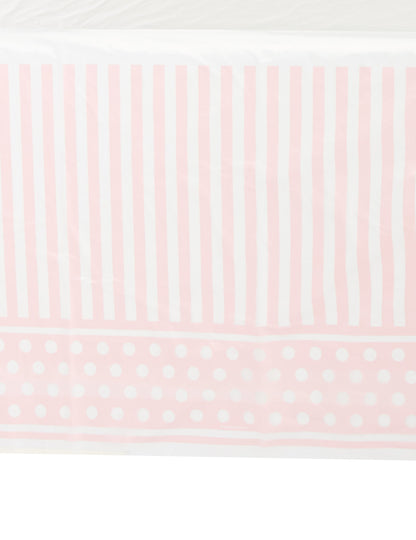 Détail des motifs de la nappe en plastique rayé et à pois pour fête rose et blanc