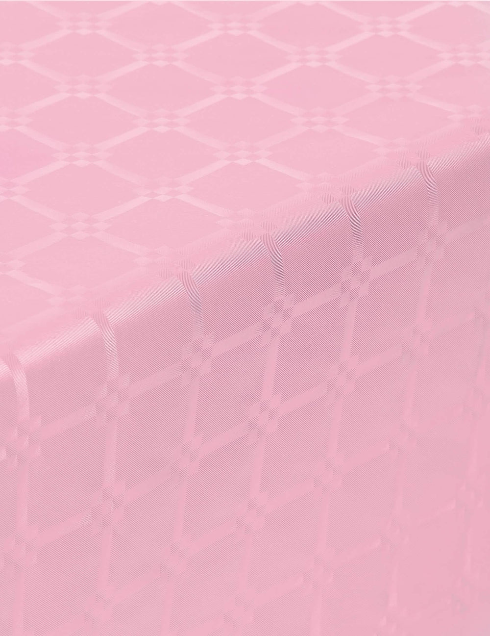 Détail des motifs de la nappe en rouleau papier damassé rose pastel